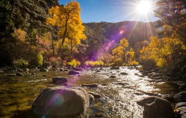 Sun shining on a wide river